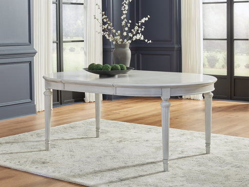 Montelaine Dining Extension Table - Jax Mattress (Jacksonville, FL)